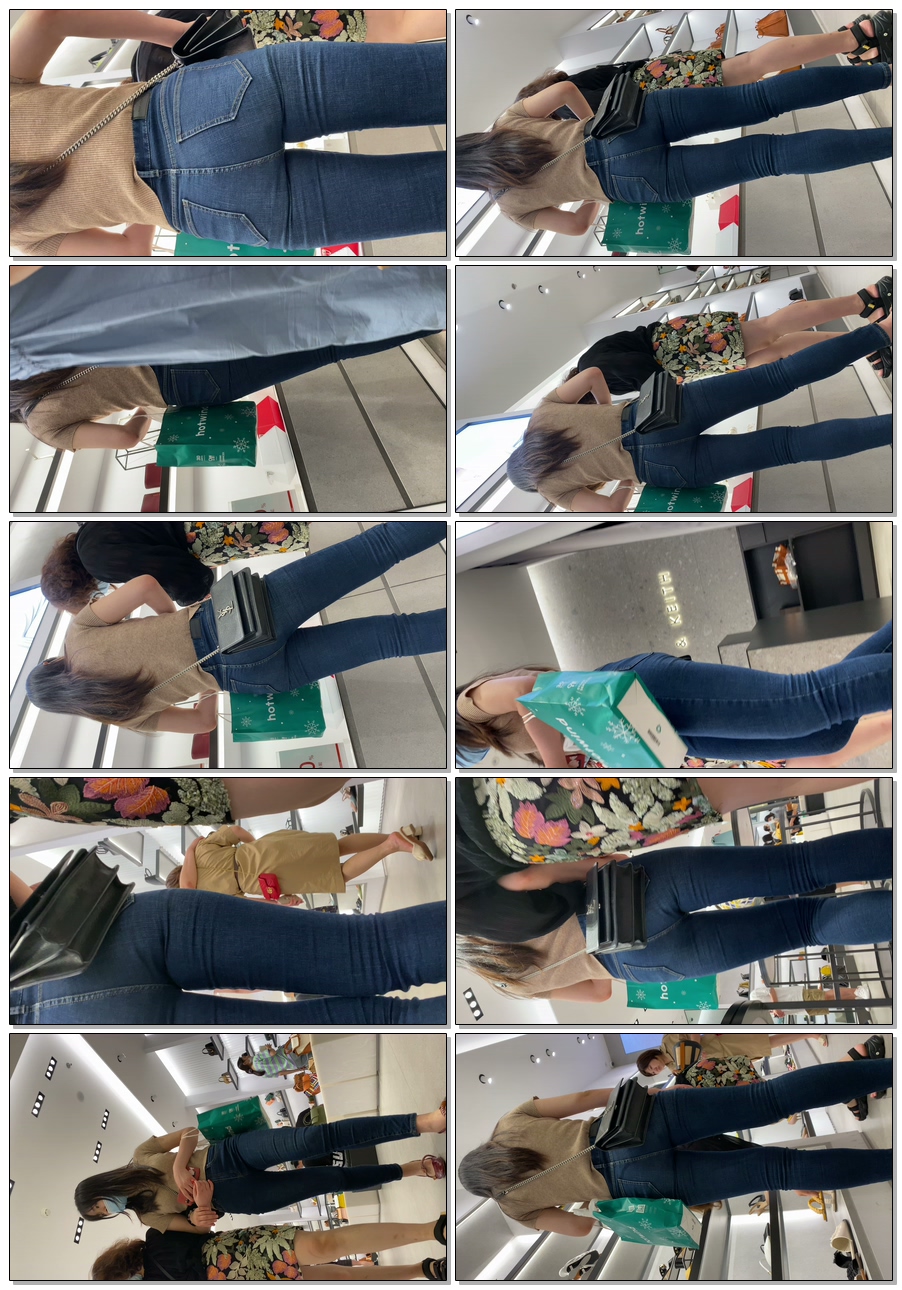 穿着蓝牛紧身裤美女和妈一起逛街